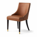 Chaise en cuir synthétique marron avec pieds en bois et embouts dorés