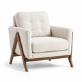Fauteuil en bois et tissu bouclé crème
